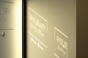 A close up of a wall with a light shining on it